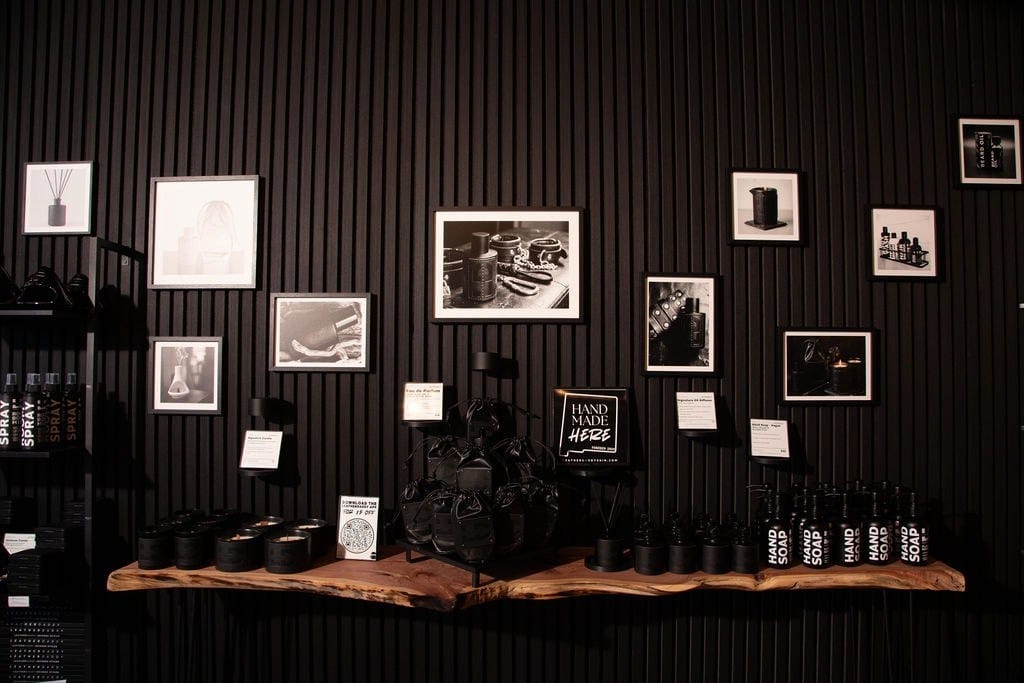 The LeatherDaddy Eau de Parfum display wall.